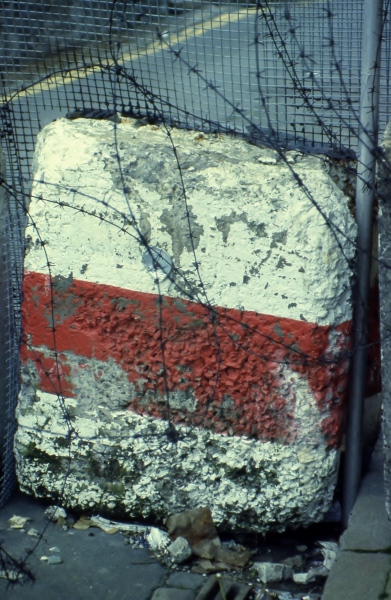 In Their Place (1986) City walls, Derry. Security bollard, Bishop Street Within (research image)