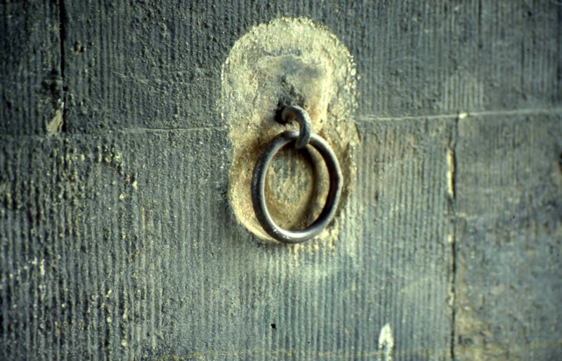 In Their Place (1986) City walls, Derry. Metal rings Ferryquay Gate (research image)