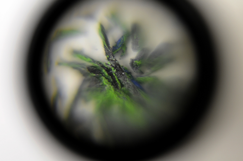 Itch (1999) (detail)&nbsp;88 x 34 x 34 cm.&nbsp;Magnifier Lupe 8x, scrapings from a lottery scratch card, plinth &nbsp;