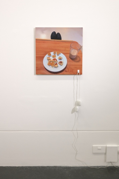 It&rsquo;s you it&rsquo;s you it&rsquo;s you (2017)&nbsp;variable dimensions (image 500 x 500 x 70mm) C-type print mounted on 18mm ply, sleep therapy pillow speakers, self-adhesive plastic hook (white) Audio '...In another such interactive work a pair of small sleep therapy pillow speakers play a rendition recorded on a mobile phone of an Irish country easy listening song made famous by Joe Dolan; It's You It's You, It&rsquo;s You, (the title of the work). Wires belonging to the speakers hang over a self-adhesive plastic hook attached to a photograph depicting an image of a tray with uneaten pancake and a glass of tea belonging to two small neatly clad feet in black shoes protruding from the far edge...' &nbsp; (text extract from&nbsp;Especiallyeverything: the practices of Locky Morris,&nbsp;Anne Tallentire,&nbsp;Once a day every day all day long, Locky Morris 2019)