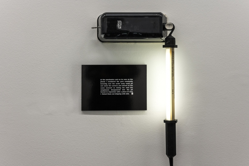 The Drop (detail) (2007 reconfigured 2016)&nbsp;variable dimensions.&nbsp; Mounted photographs, shorty tilt display stand, Smartlamp, hand cleanser dispenser, sunglasses, workshop broom '...Locky Morris&rsquo;s The Drop&nbsp;tells a story, but it also makes us act out a sort of double-take, running between the different parts of the installation to piece together and relive the moment when &ndash; plop/click &ndash; the glasses disappeared into that trough of filth, and the camera simultaneously captured the scene. It&rsquo;s an impossible, comic moment, but also one where you shake your head and think, &lsquo;Isn&rsquo;t it always the way?&rsquo;. Like most of Morris&rsquo;s work, The Drop springs from photography to entangle us in that brief incident. He explores the mundane, and picks at the seemingly insignificant to bring out the humour and the deeper paradoxes in those moments, the forgotten fascinating corners in the day&rsquo;s repetitive chores...'&nbsp; &nbsp; (text extract from Ridiculous Beginnings, Chris Fite-Wassilak for&nbsp;Stop lookin' at Photographs!, Locky Morris, Naughton Gallery, Belfast (2017)&nbsp;